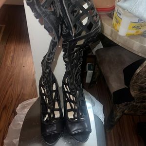 Knee high heels with strap design